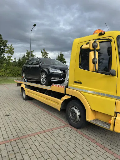 LAWETA OLSZTYN POMOC DROGOWA TANIO SLY SYLWESTER WIŚNIEWSKI